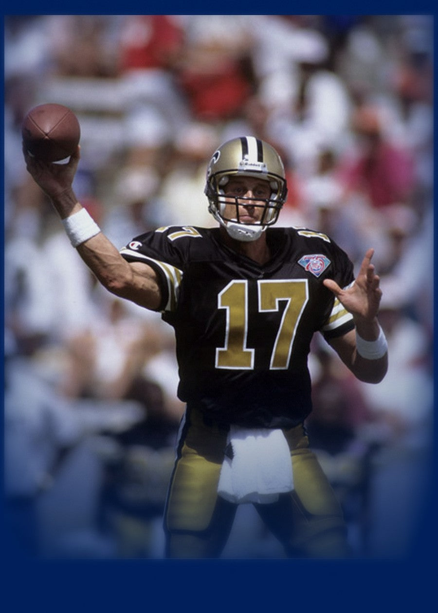 Jim Everett throwing in a New Orleans Saints jersey